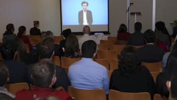 audience watching scholar introduction videos