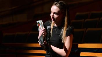 Audience member asks question