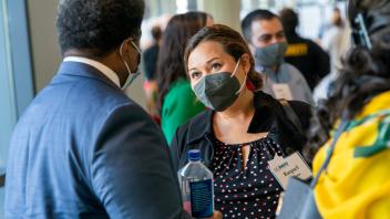 Raquel Aldana and Damon Tull chat before the talk