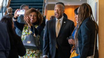 Chancellor May and Lashelle May take a pciture