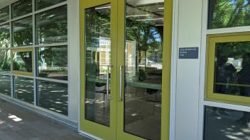 door to meeting room of international house