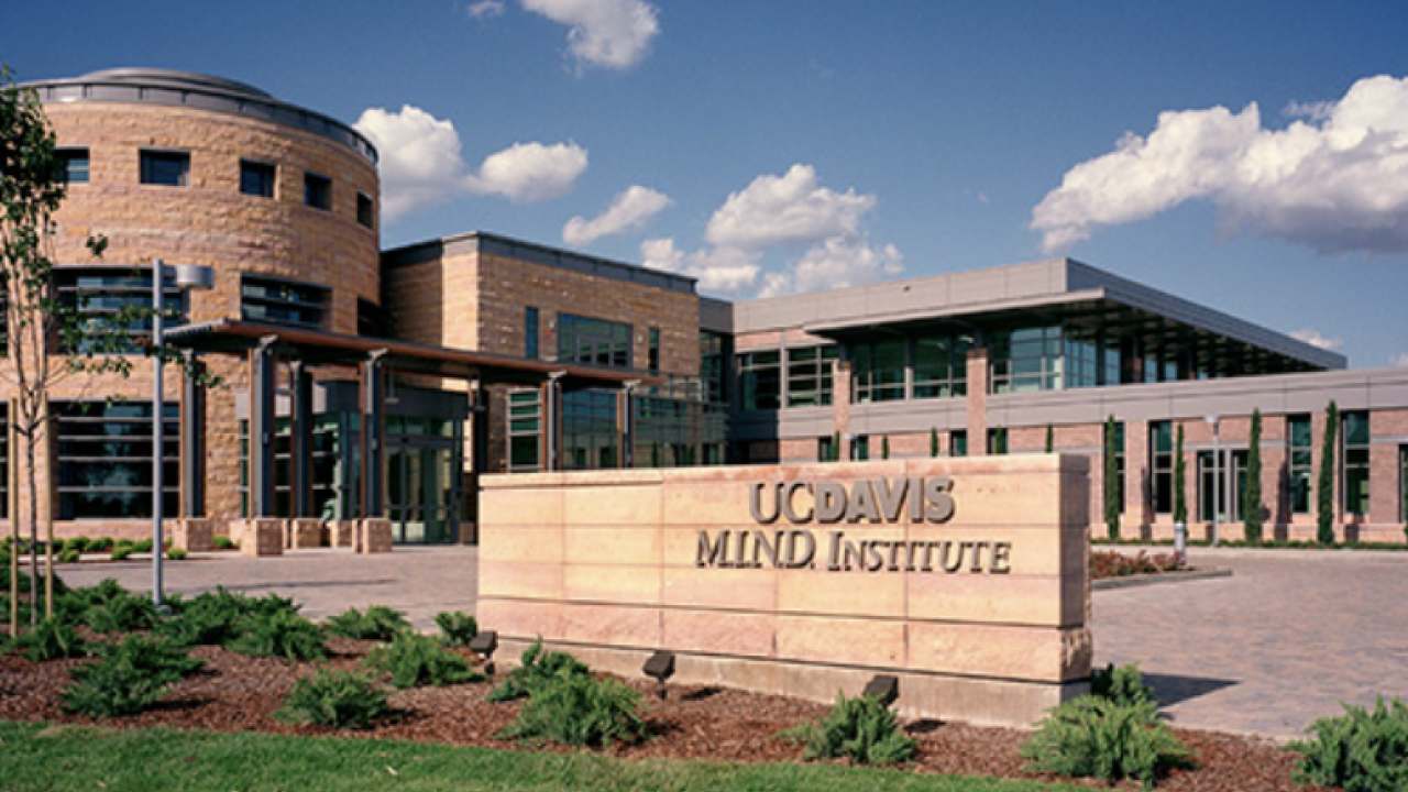 Exterior view of the UC Davis MIND Institute with modern architecture.