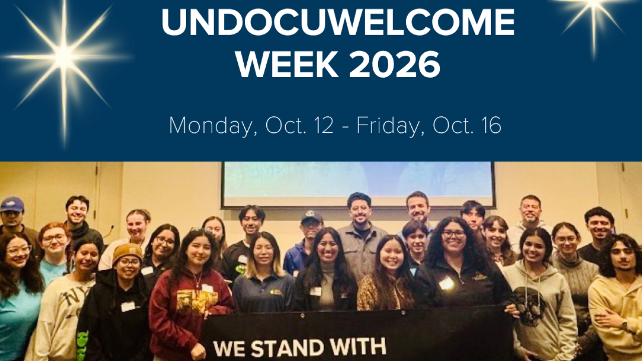 UC Davis poster: students holding 'We stand with undocumented students' banner