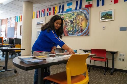 Lina Mendez, the Associate Director at the Center for Chicanx and Latinx Academic Student Success puts together Welcome packets for the incoming freshmen living in the Casa Cuauhtémoc Living-Learning Community in the residence halls.