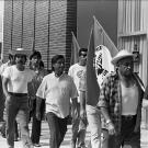 Cesar Chavez (center) on march from Mexican border to Sacramento with United Farm Workers members in Redondo Beach, California.