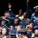 Group of students at black graduation ceremony.
