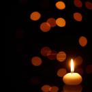 Warm Candle and bokeh lights